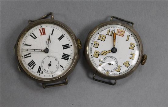An early 20th century silver military wrist watch and one other early 20th century silver wrist watch (no straps).